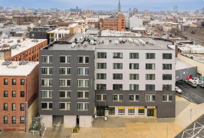 an aerial view of a building in a city at Cozy 1BR Apartment in Philly Prime Location in Philadelphia