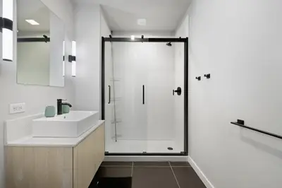 a bathroom with a shower and a sink at Cozy 1BR Apartment in Philly Prime Location in Philadelphia