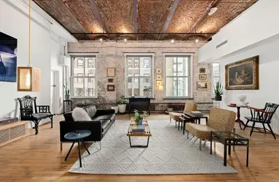 a living room with a couch and chairs at Sun-Filled Luxury Historic 2 Bedrooms apto in New York