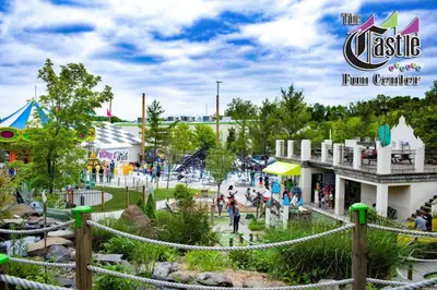 a group of people walking around an amusement park at Hay Loft in Historic Barn - 4 Minutes to Legoland in Goshen