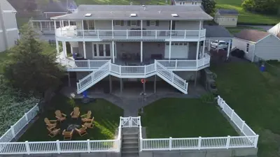 an aerial view of a large white house at The Riverfront in Easton