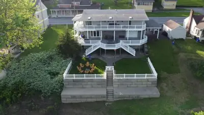 an aerial view of a large white house at The Riverfront in Easton