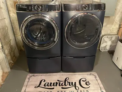 two washing machines are sitting next to each other at Charming Farmhouse In Quarryville,PA in Quarryville