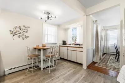 a kitchen with a table and chairs in a room at Family Retreat Near NYC w/ Parking & Views in Hackensack