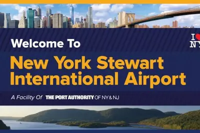 a banner for a new york skyscraping international airport at Historic Barn - 2 Bedroom Apartment Close To Legoland NY in Goshen