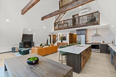 a kitchen and living room with an open floor plan at Hot Tub Sauna Spacious Backyard Luxury in Jim Thorpe
