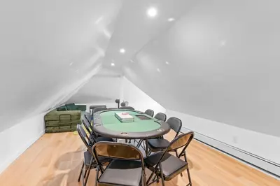 a meeting room with a table and chairs at 17m to NYC,5 min to American Dream,2Parking Spaces in Carlstadt