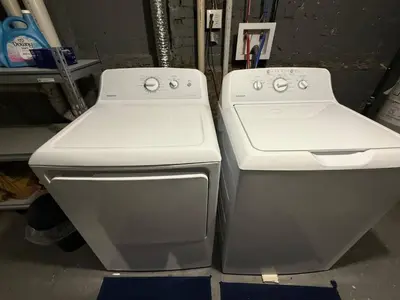 two white ovens sitting next to each other in a garage at Modern 3BR Home | Chic & Cozy | 30 Min NYC Access in Jersey City
