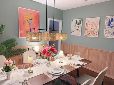 a dining room with a table with flowers on it at Princeton Einstein Boutique Stay in Princeton