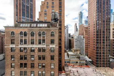 a view of a building under construction in a city at Blueground Murray Hill fitness center nr Bryant Park NYC-2171 in New York