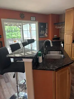 a kitchen with a sink and a counter at Private oasis near Lititz in Lancaster
