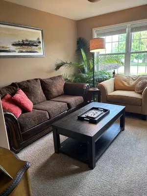 a living room with a couch and a coffee table at Private oasis near Lititz in Lancaster