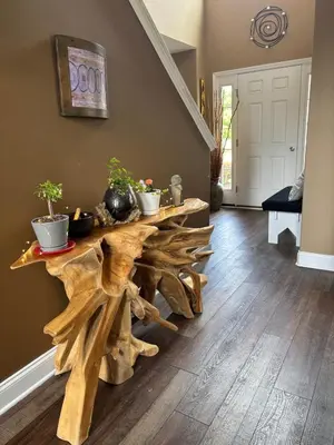 a living room with a table made out of logs at Private oasis near Lititz in Lancaster