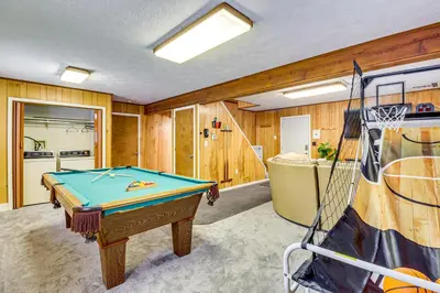 a room with a pool table and a kitchen at Scenic Views! Clifton Twp Chalet with Fire Pit, Deck in Gouldsboro