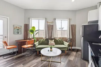a living room with a couch and a table at Stay at Luna on 16th & Ridge Ave in Philadelphia