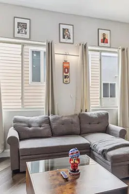 a living room with a couch and a coffee table at Stay at Luna on 16th & Ridge Ave in Philadelphia