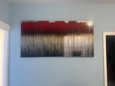 a painting hanging on a white wall at Heavenly Retreat Luxury 3 Bedrooms 1 Bathroom in East Orange