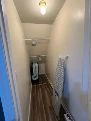 a small room with a hallway with a stairway with at Comfortstayrus in Orange