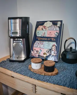 a counter top with a coffee maker and a box at Cozy Apt With King Size Bed- Only 5 Miles to NYC in North Bergen