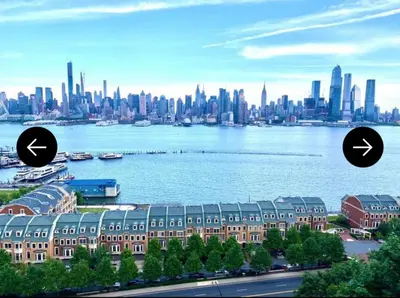 a view of a large city with a large body of water at Cozy Apt With King Size Bed- Only 5 Miles to NYC in North Bergen