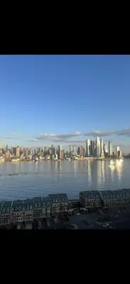 a view of a city across the water at Private Suite Hudson River View in Union City