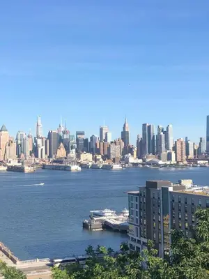 a view of a city with a large body of water at Private Suite Hudson River View in Union City