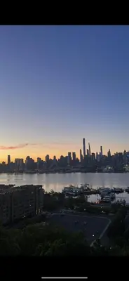 a view of a city skyline with a large body of water at Private Suite Hudson River View in Union City