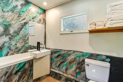 a bathroom with a sink and a toilet at Deluxe Cabin D at Elk Creek Escape! Pets Welcome in Hillsgrove