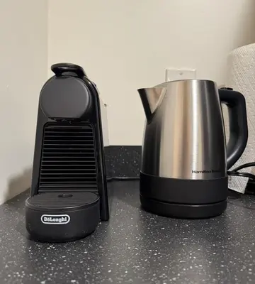 a coffee maker sitting on top of a counter at CASA 311 ! Welcome Home Private Parking Included in Jersey City