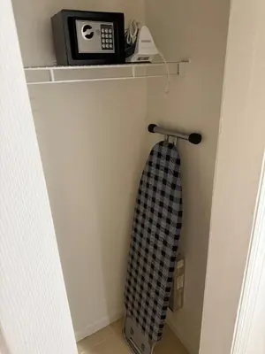 a kitchen shelf with a toaster and a microwave on it at CASA 311 ! Welcome Home Private Parking Included in Jersey City