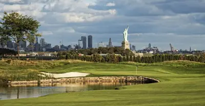 a golf course with the statue of liberty in the background at CASA 311 ! Welcome Home Private Parking Included in Jersey City