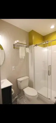 a bathroom with a toilet and a shower at Bright Private Apartment in University city near Drexel&UPenn in Philadelphia