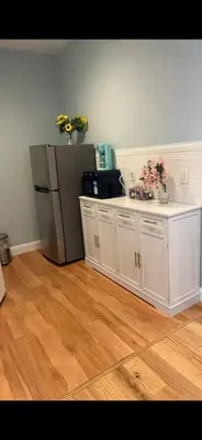 a kitchen with a white counter and a refrigerator at Fresh&Quiet one bedroom Apartment in University City near Drexel&UPenn in Philadelphia