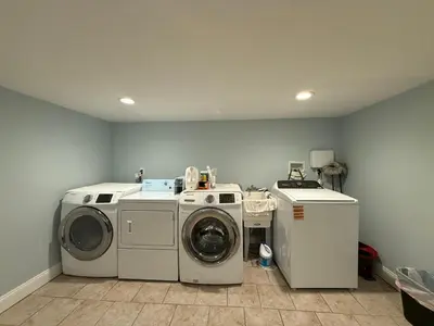 a laundry room with a washer and dryer at Fresh&Quiet one bedroom Apartment in University City near Drexel&UPenn in Philadelphia