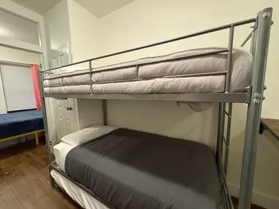 a bunk bed in a small room with a bunk bedutenewayangering at The W50 Metropolitan in New York
