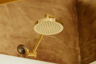a shower with a shower head in a bathroom at The Ashfield House - Close to Downtown Lancaster in Lancaster