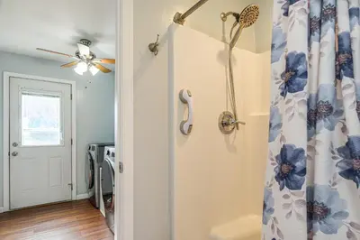 a shower in a bathroom with a shower curtain at Close to Venues and Fairgrounds! York Area Home in Red Lion