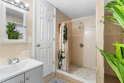 a bathroom with a sink and a shower at Queen Bedroom w Ensuite Bathroom - Mins from NYC in Jersey City