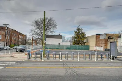 a parking lot with a bunch of parking meters at Walkable Jersey City Stay Near Parks and Dining! in Jersey City