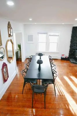 a dining room with a table and chairs in a room at Private 10 guest Getaway Fire-Pit Golf Hike Ski Spa in Vernon