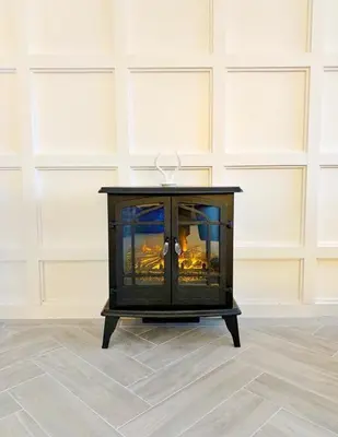 a black cabinet with glass doors in a room at Luxe 10 guest Ski Cabin - Snowboarding Hiking Pools Golf Tennis in Vernon Township
