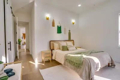a bedroom with a large bed in a room at 5 Mi to NYC Bright and Chic Jersey City Getaway! in Jersey City