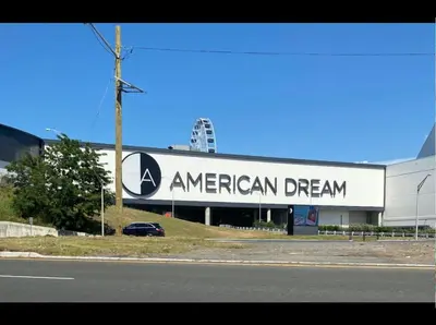a american dream sign on the side of a building at Spacious 3BR Home Near Newark Airport in Newark