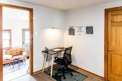 a room with a desk and a chair and a door at Charming 2 Bedroom Apartment Near NYC, Metlife Stadium in Hackensack
