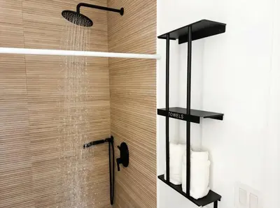 a shower in a bathroom with a glass shower curtain at Easy-Access & Quick to NYC, EWR, Dream Mall, Stadium in Jersey City