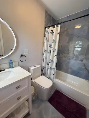 a bathroom with a sink and a toilet and a shower at New house close to Fairmount Park in Philadelphia