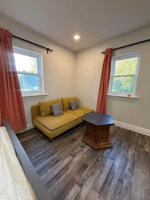 a living room with a couch and a table at New house close to Fairmount Park in Philadelphia
