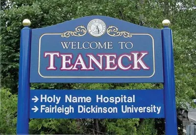 a sign for a sign for a school in a park at Serene Hamilton ELM 13MI to Time Square Laundry Easy Parking in Teaneck