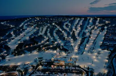 an aerial view of a ski resort in the snow at Moonlight Mountain Lodge on Camelback Mountain! in Tannersville