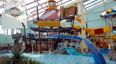 a large indoor water park with a roller coaster at Moonlight Mountain Lodge on Camelback Mountain! in Tannersville
